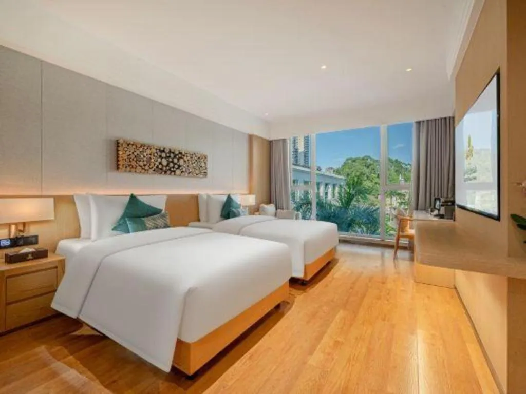 Bed in Dongguan Castfast Hotel