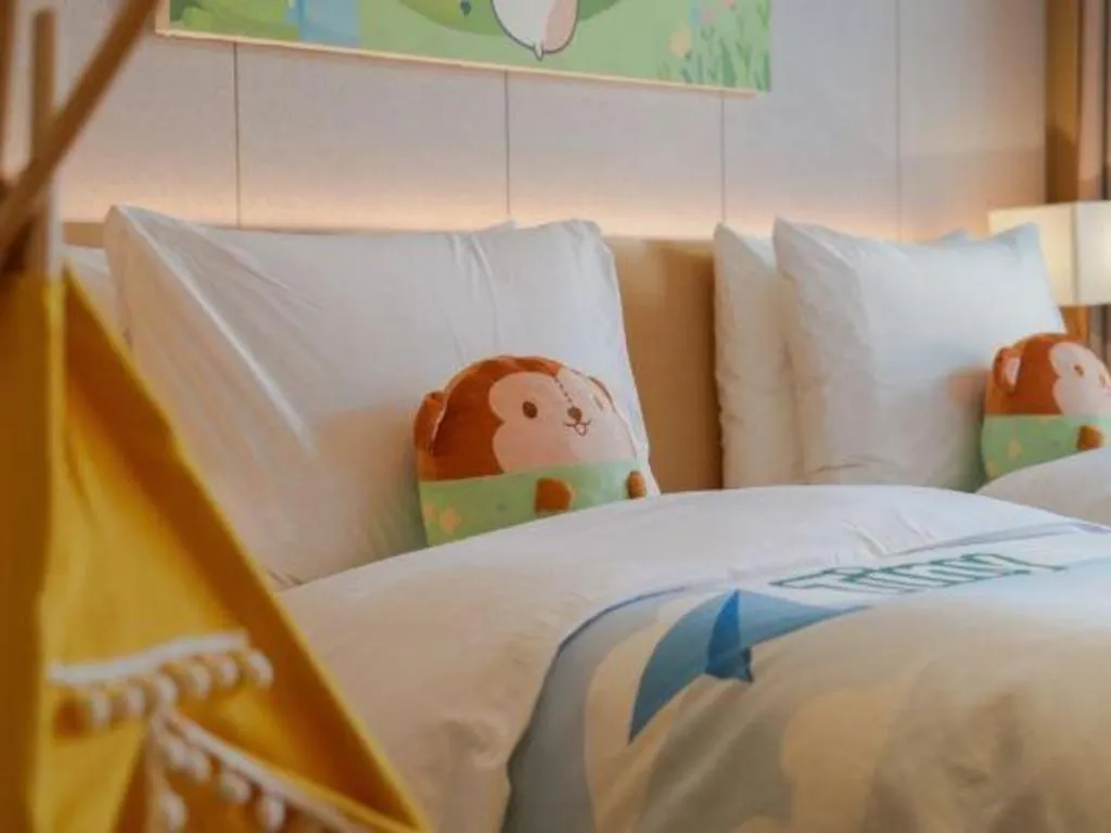 Bed in Dongguan Castfast Hotel