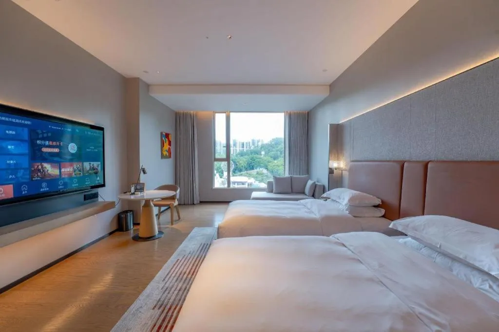 Bed in Dongguan Castfast Hotel