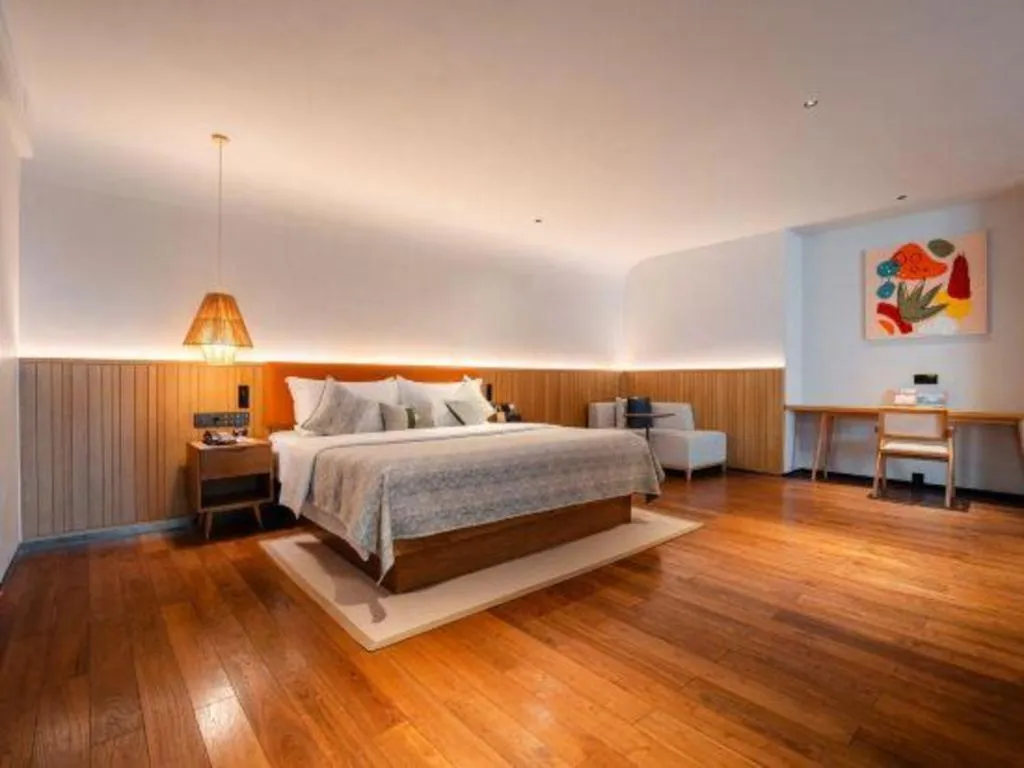 Bed in Dongguan Castfast Hotel