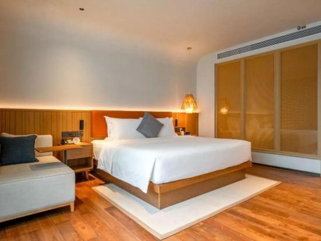 Bed in Dongguan Castfast Hotel