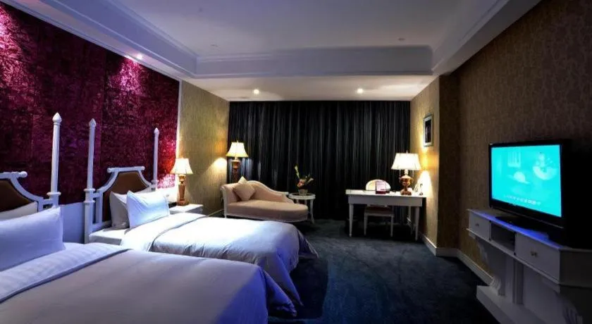 Bed in Dongguan Castfast Hotel