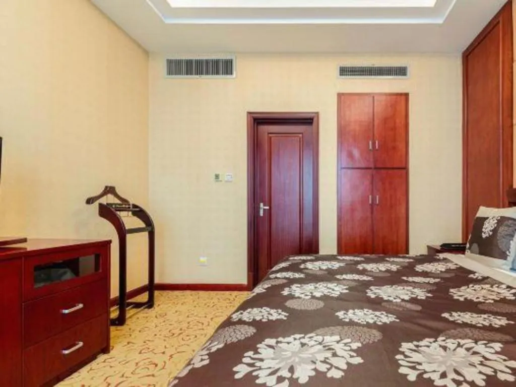 Bed in Qingdao Chengyang Detai Hotel