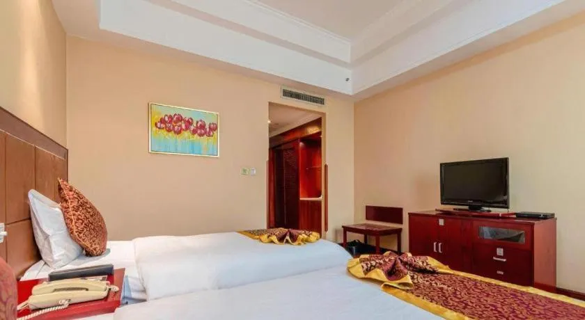 Bed in Qingdao Chengyang Detai Hotel