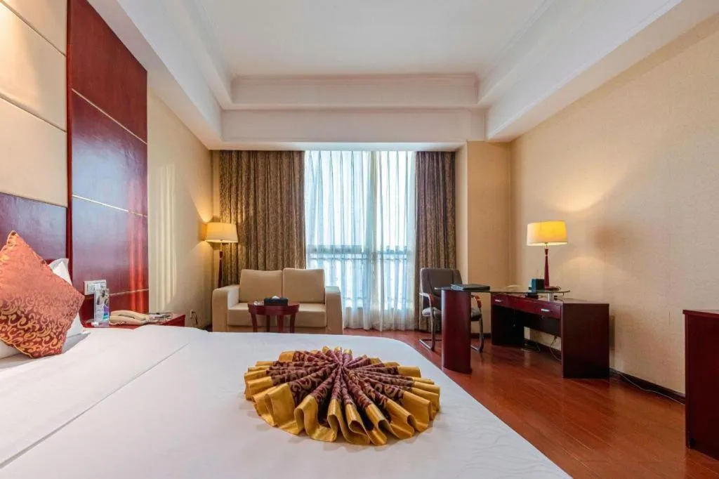 Bed in Qingdao Chengyang Detai Hotel