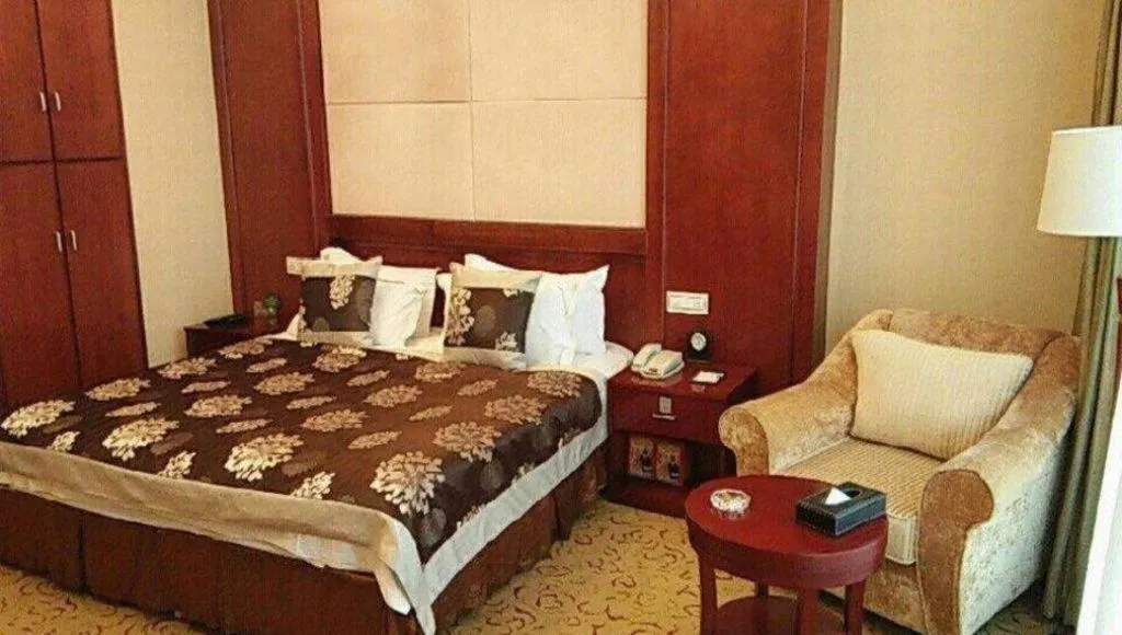 Bed in Qingdao Chengyang Detai Hotel