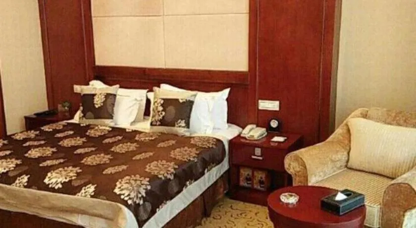 Bed in Qingdao Chengyang Detai Hotel