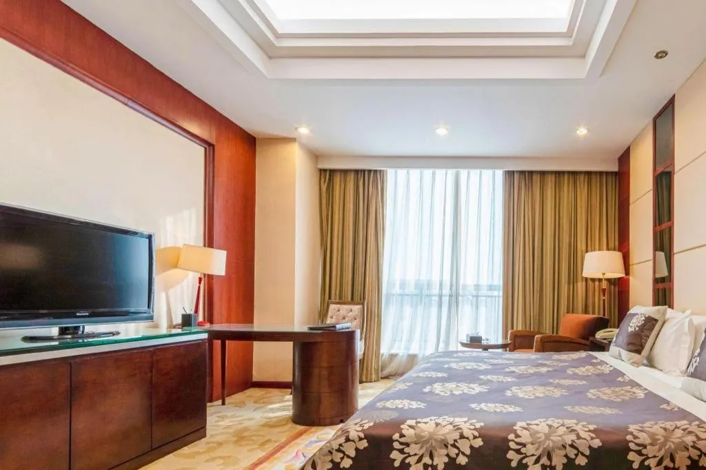 Bed in Qingdao Chengyang Detai Hotel