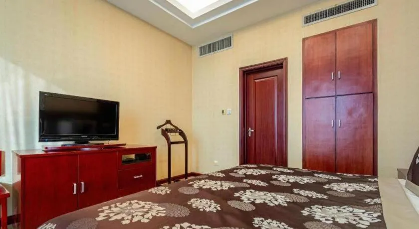 Bed in Qingdao Chengyang Detai Hotel