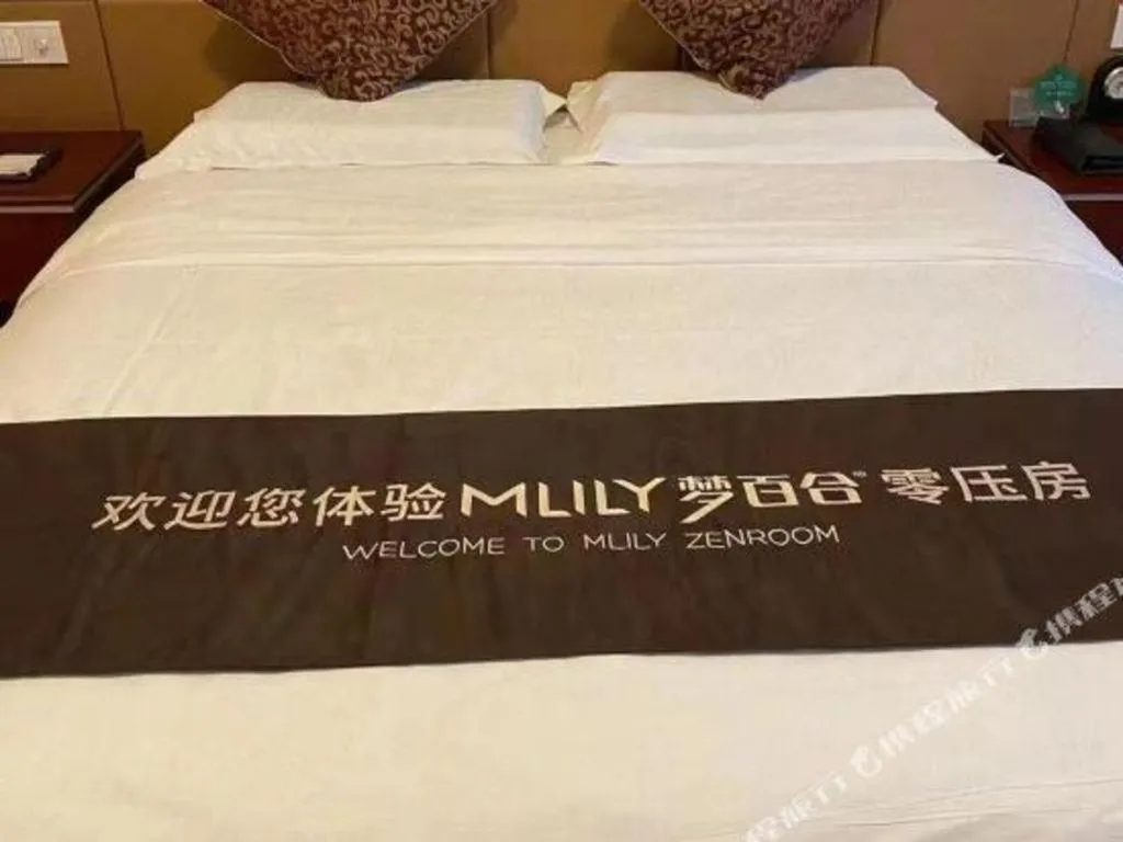 Bed in Qingdao Chengyang Detai Hotel