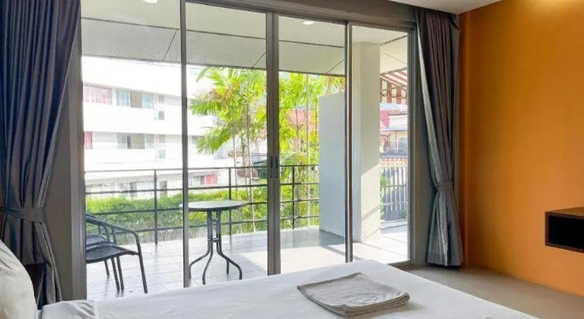 Bed in The Living Pool Villas