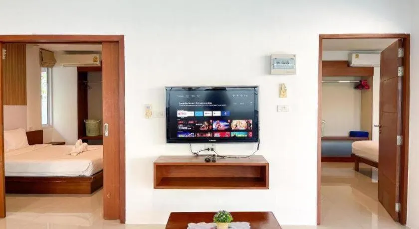 Bed in The Living Pool Villas