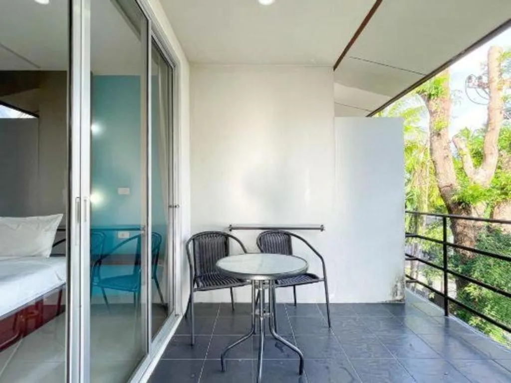 Bed in The Living Pool Villas