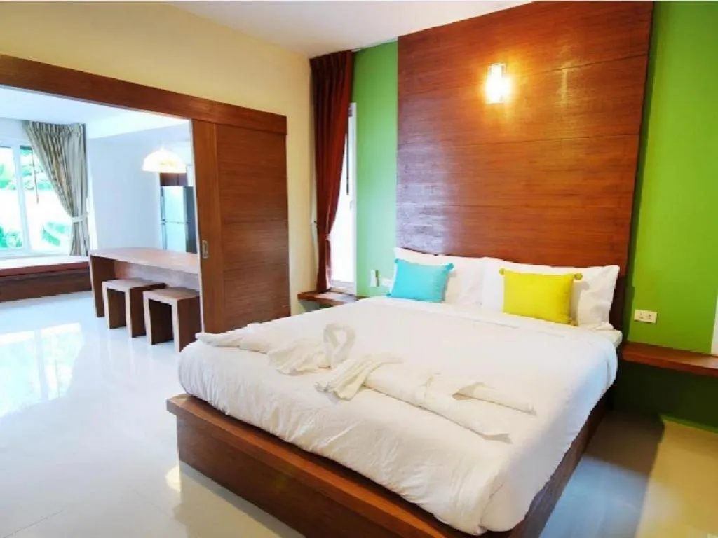 Bed in The Living Pool Villas