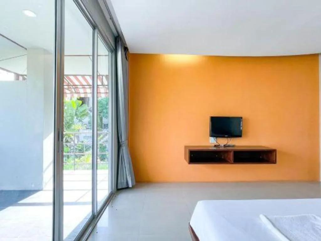 Bed in The Living Pool Villas