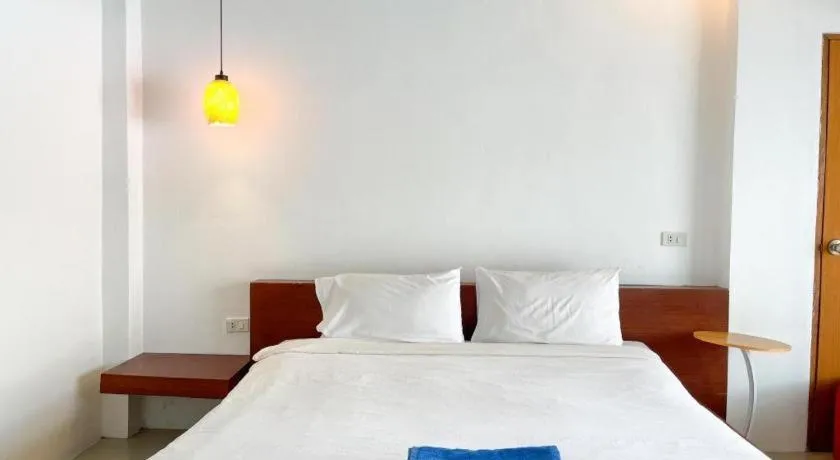 Bed in The Living Pool Villas