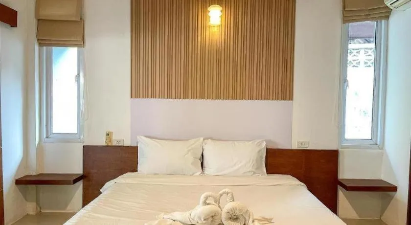 Bed in The Living Pool Villas