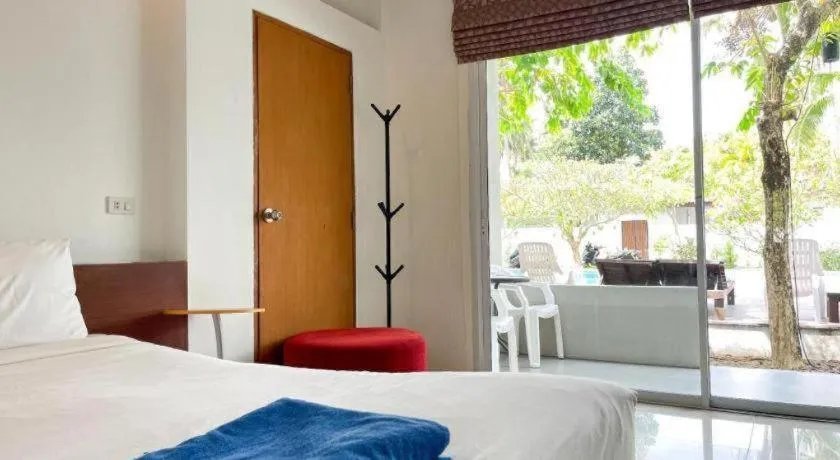 Bed in The Living Pool Villas