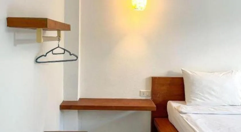 Bed in The Living Pool Villas