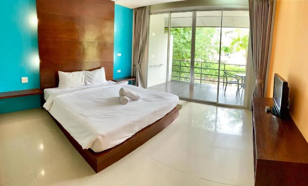 Bed in The Living Pool Villas