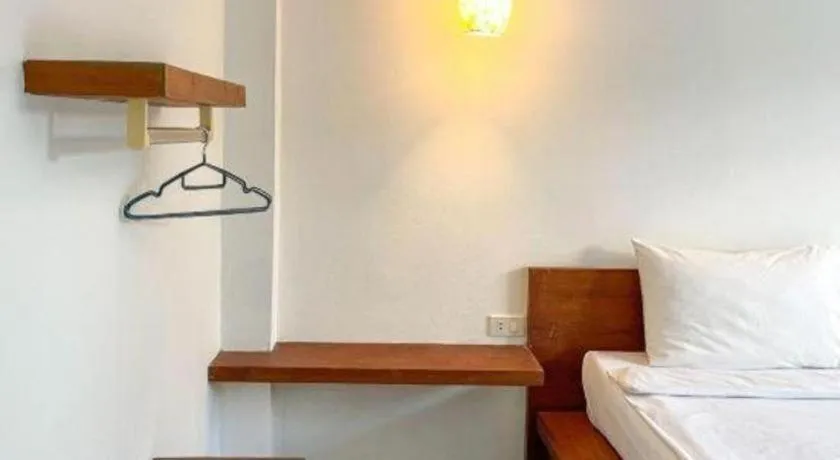 Bed in The Living Pool Villas