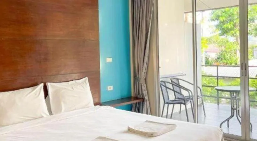 Bed in The Living Pool Villas