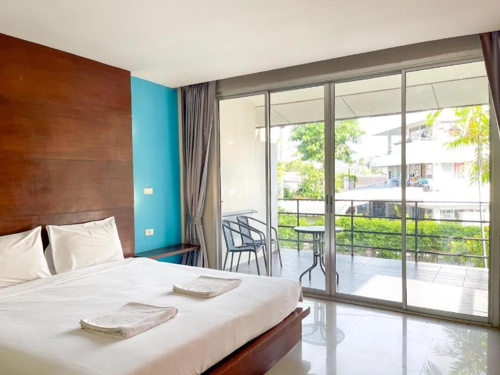 Bed in The Living Pool Villas