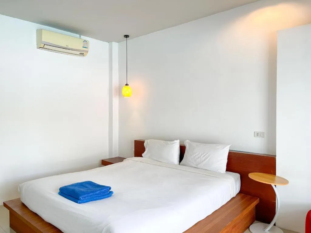 Bed in The Living Pool Villas