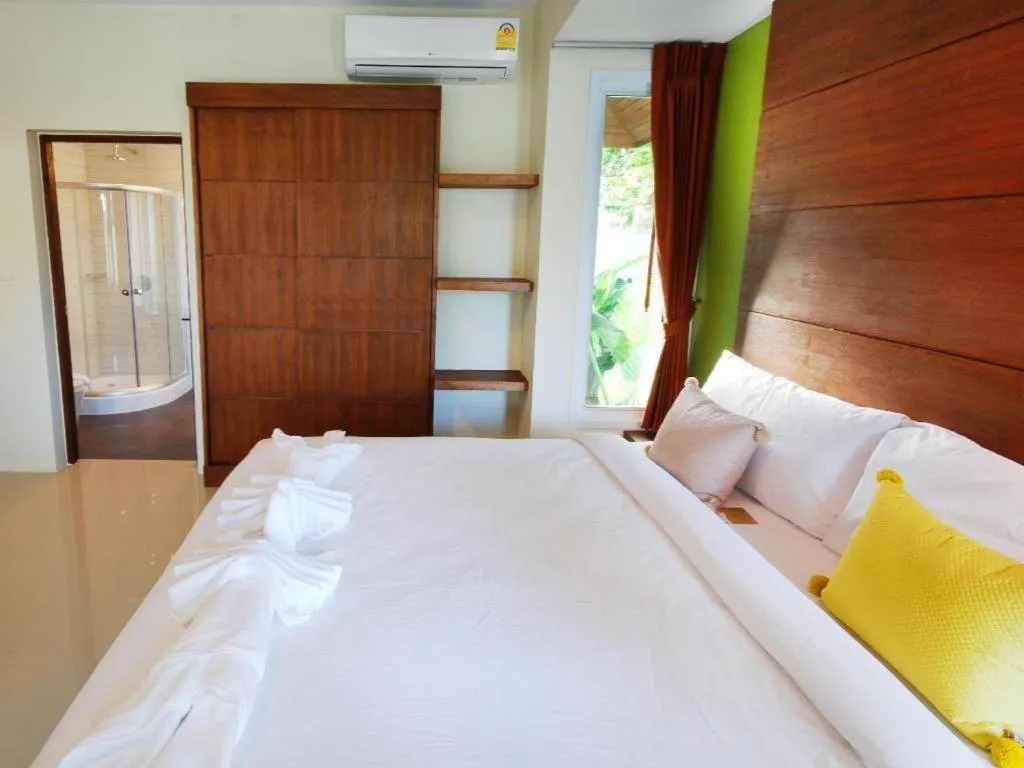 Bed in The Living Pool Villas