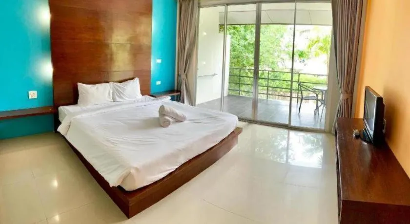 Bed in The Living Pool Villas