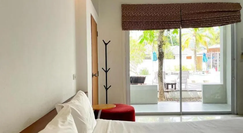 Bed in The Living Pool Villas