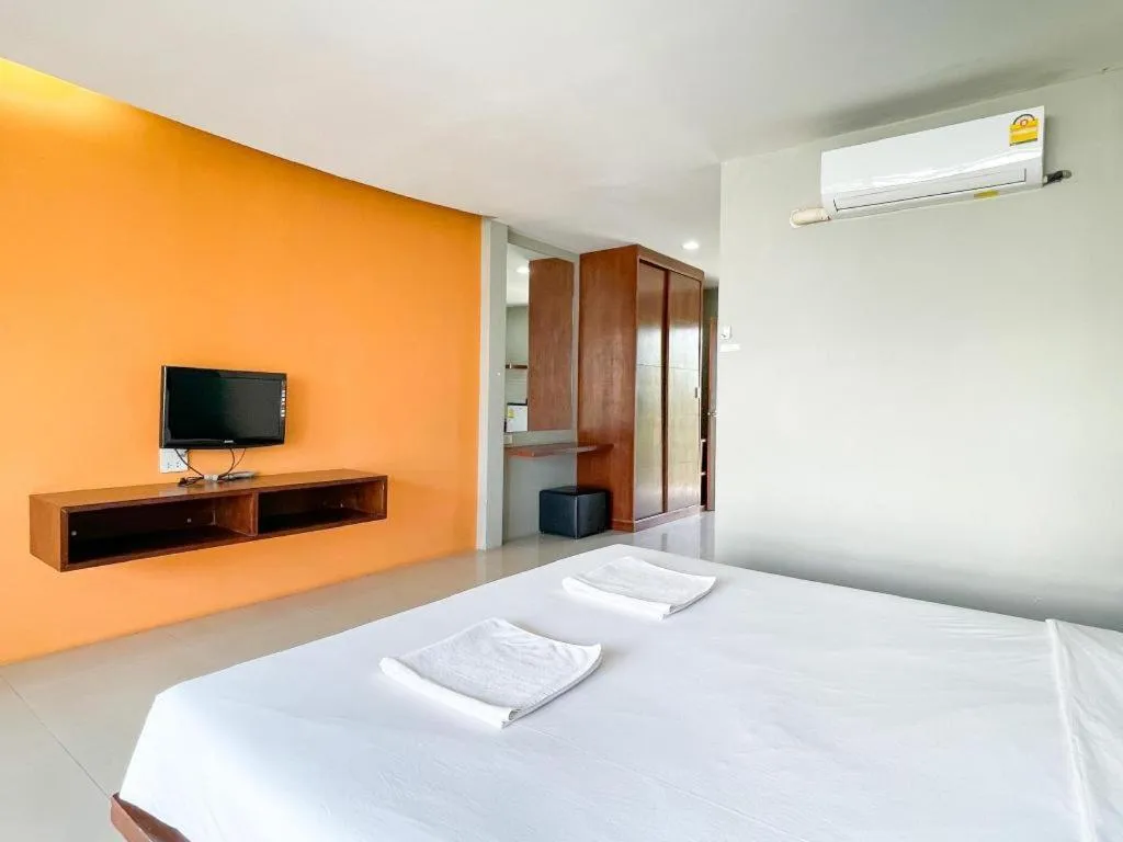 Bed in The Living Pool Villas