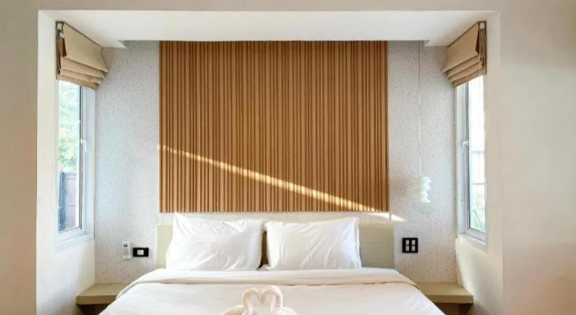 Bed in The Living Pool Villas