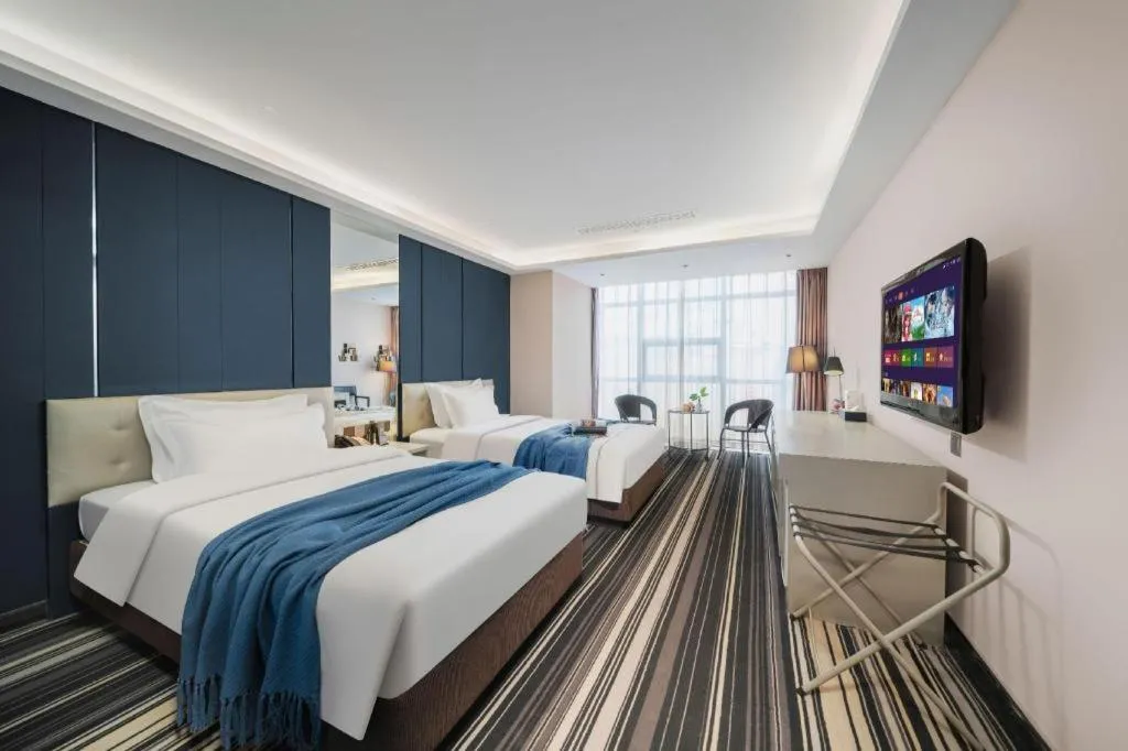 Bed in Urumqi Bayinhe Hotel