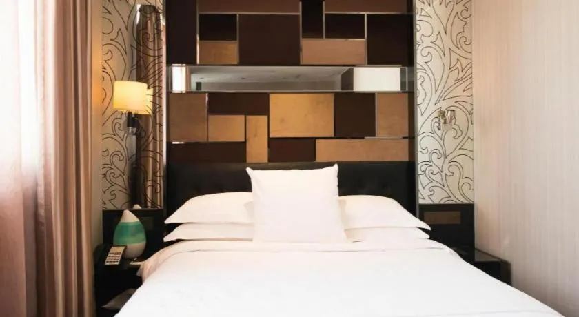 Bed in Urumqi Bayinhe Hotel