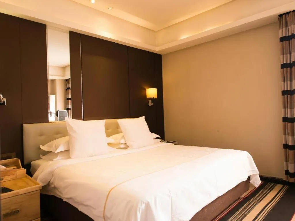 Bed in Urumqi Bayinhe Hotel