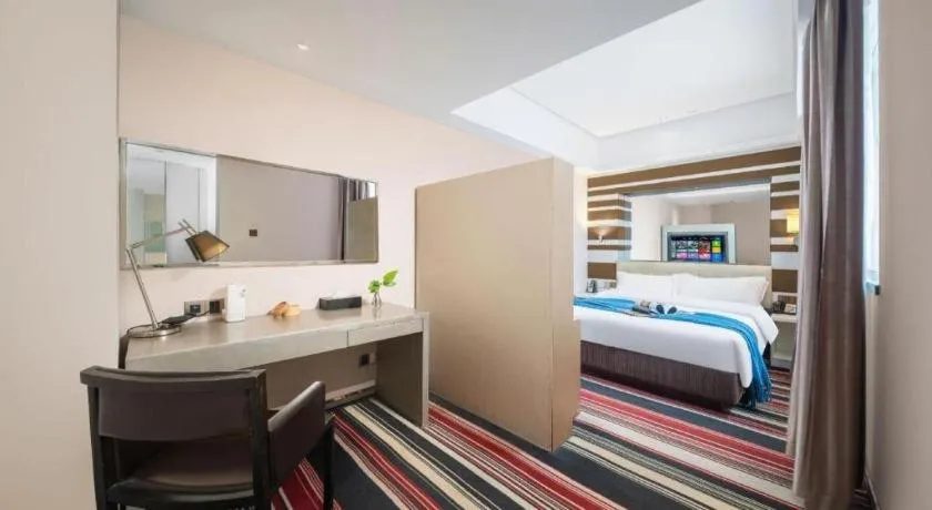 Bed in Urumqi Bayinhe Hotel