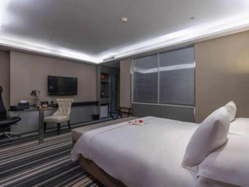 Bed in Urumqi Bayinhe Hotel