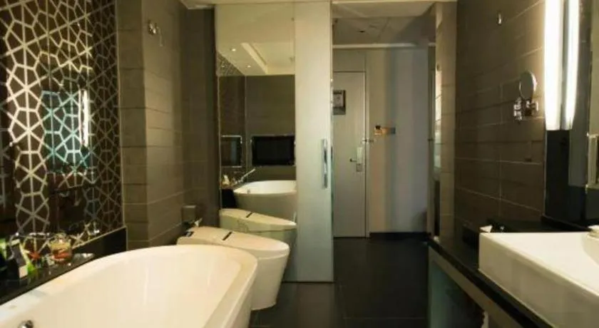 Bed in Urumqi Bayinhe Hotel