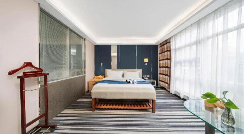 Bed in Urumqi Bayinhe Hotel