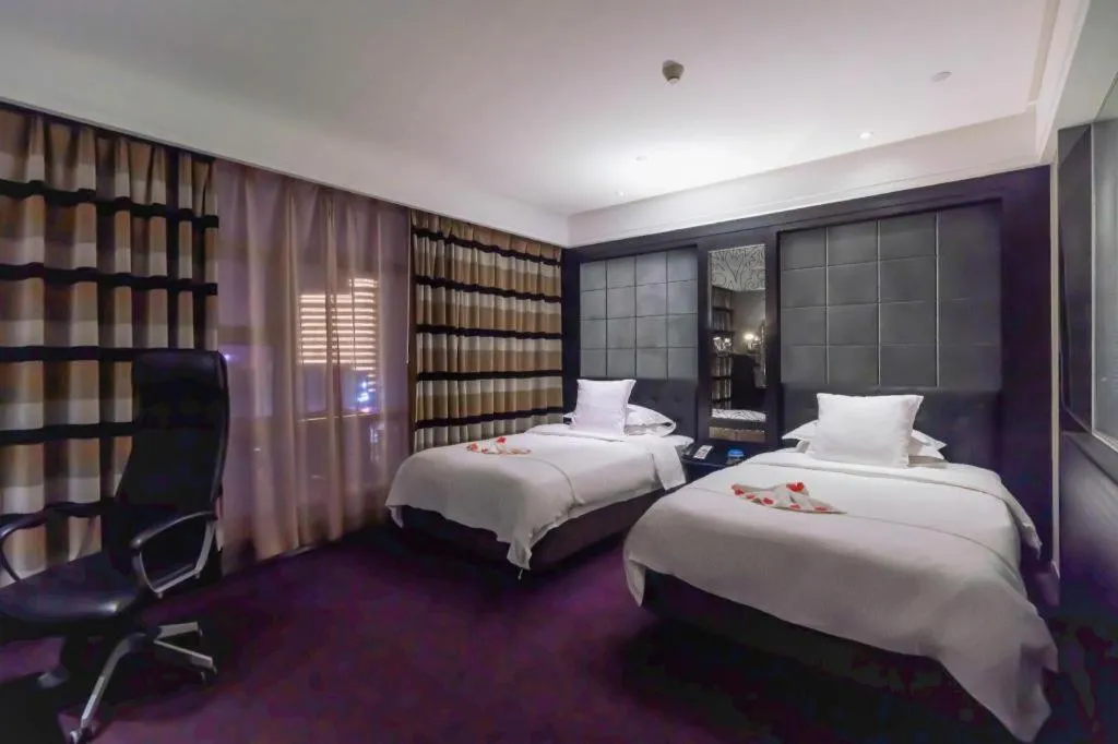 Bed in Urumqi Bayinhe Hotel