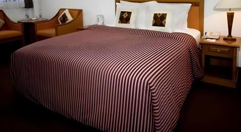 Bed in Enhaii Hotel