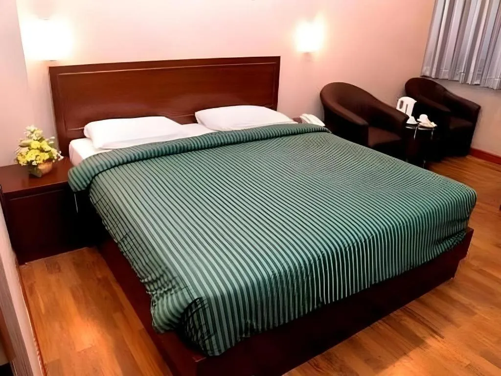 Bed in Enhaii Hotel