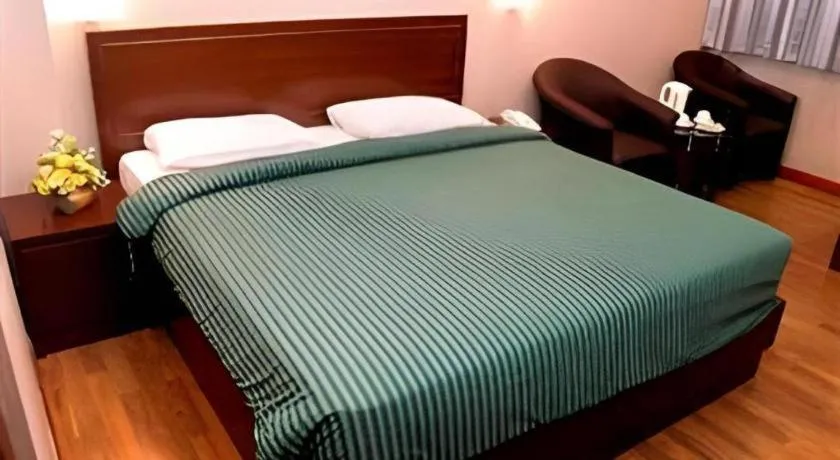 Bed in Enhaii Hotel
