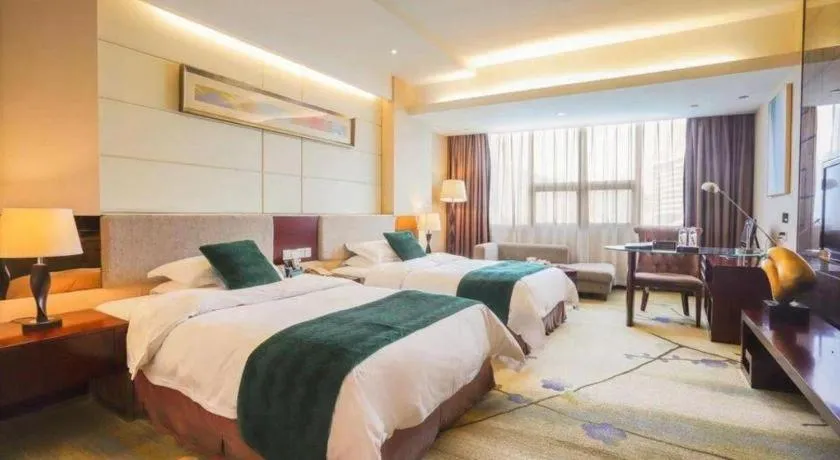 Bed in Fortune Hotel Longyan