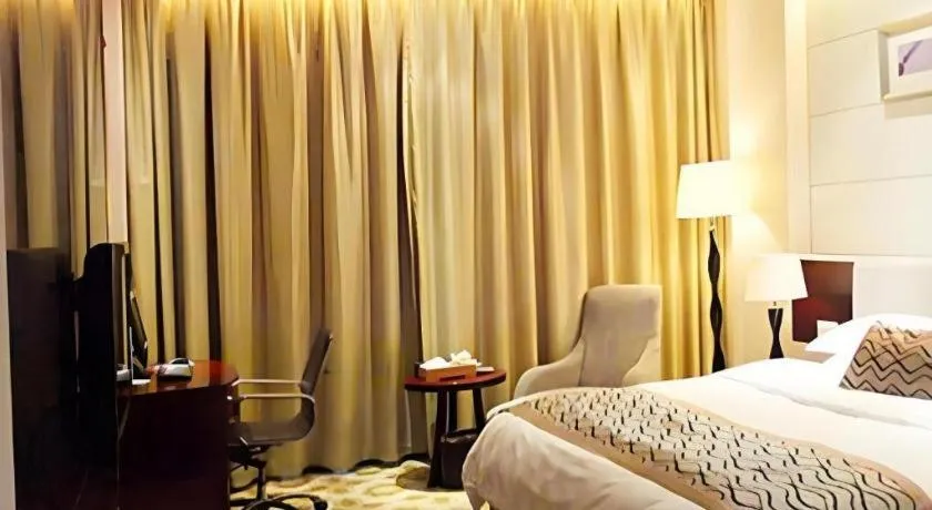 Bed in Fortune Hotel Longyan