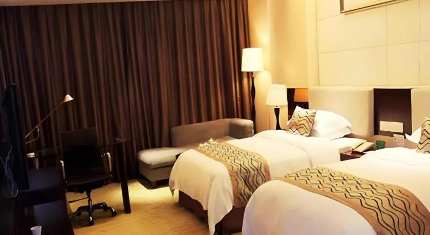 Bed in Fortune Hotel Longyan