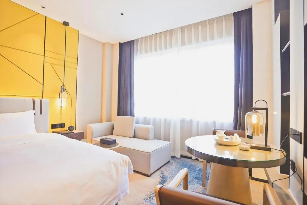 Bed in Fortune Hotel Longyan