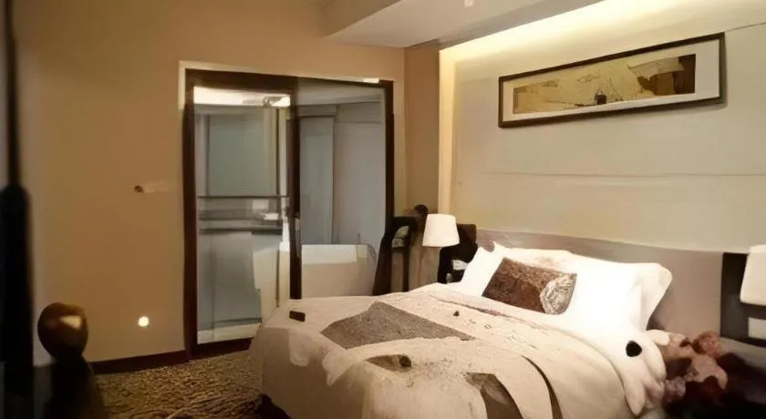 Bed in Fortune Hotel Longyan