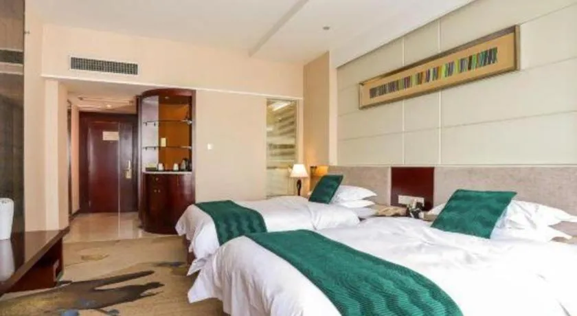 Bed in Fortune Hotel Longyan